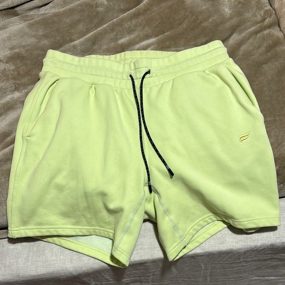 Fabletics Men's Athletic Shorts in Light Yellow - Picture 1 of 2